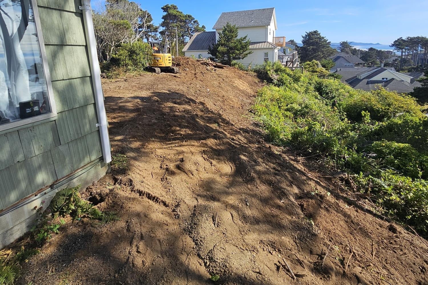 Slope next to house